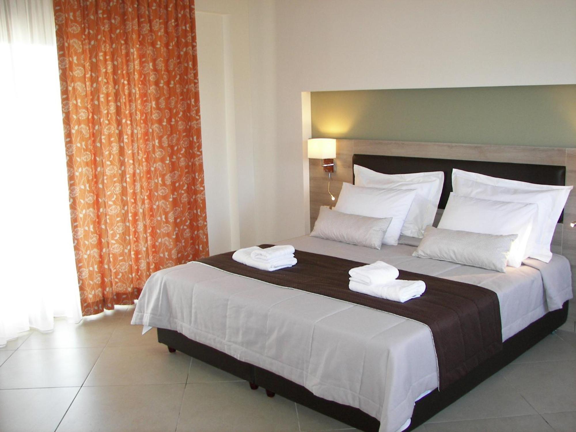 Skinari Apartments Monolia Quarto foto